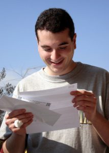 A student receives an acceptance letter after going through the college application process