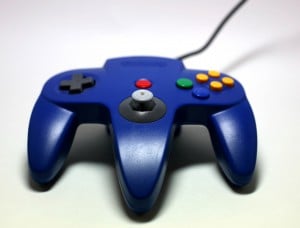 Close-up shot of a Blue Nintendo N64 Controller.