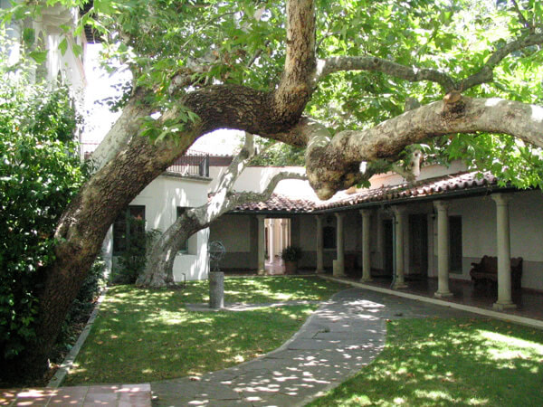 Tree-filled Balch Hall courtyard at Scripps College.