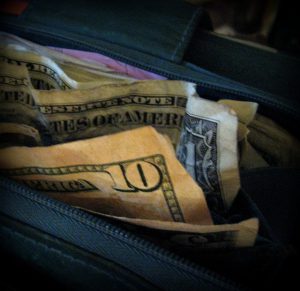 Wallet full of dollars.