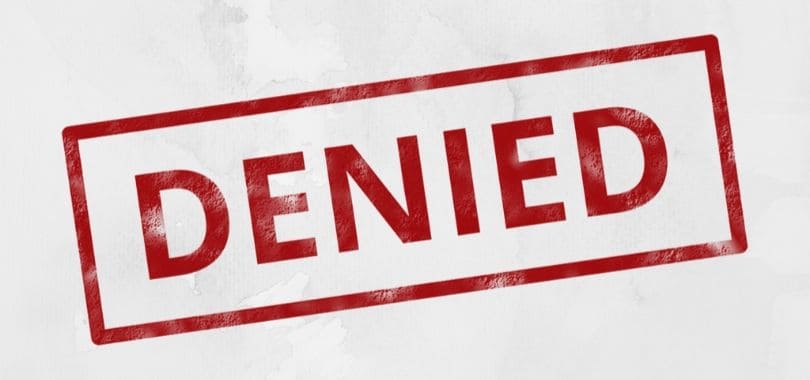 A gray background with red text that says "denied."