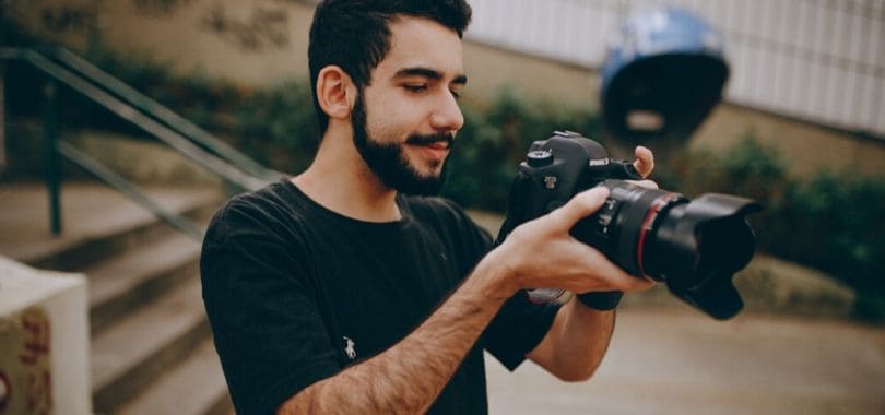 A person holding a camera.