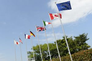 Flags on the pole of the G7 Summit.