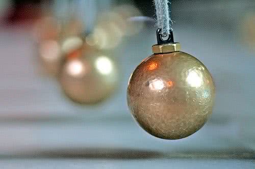 Portrait of gold Christmas balls.