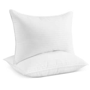 Two white Beckham Hotel Collection pillows. Click to view its Amazon page.
