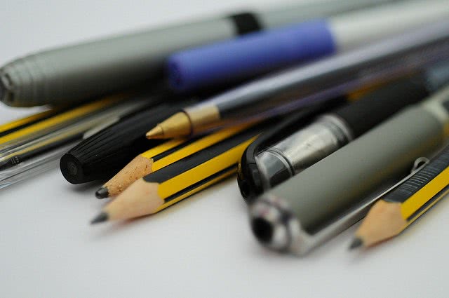 Pens and pencils a student loan co-signer might use
