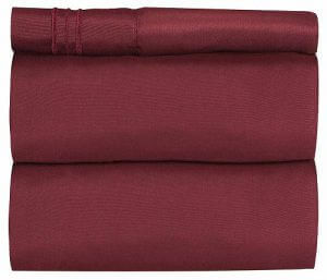 Burgundy folded bed sheets by CGK Unlimited. Linked to its Amazon page.