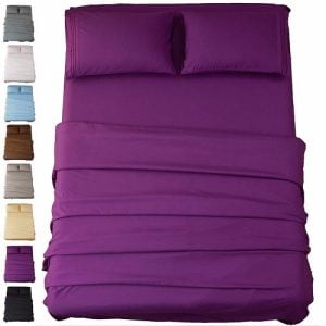 Sonoro Kate purple sheets and cases on a bed. Linked to its Amazon page.