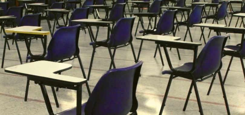 Chairs and desks at an SAT testing center.