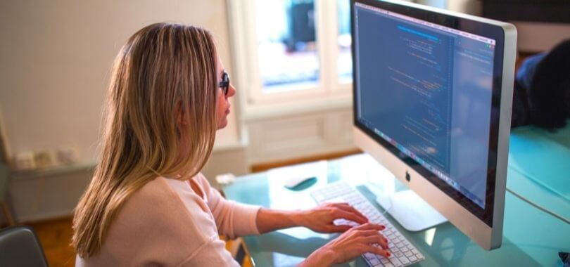 A software developer working at her computer
